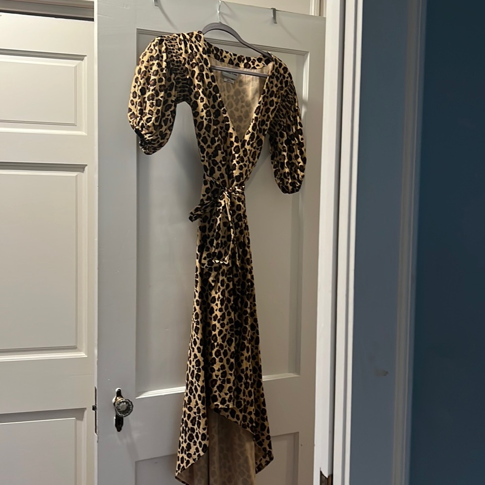 Sexy leopard puff sleeve wrap dress. Deep V, so flattering! Worn once.